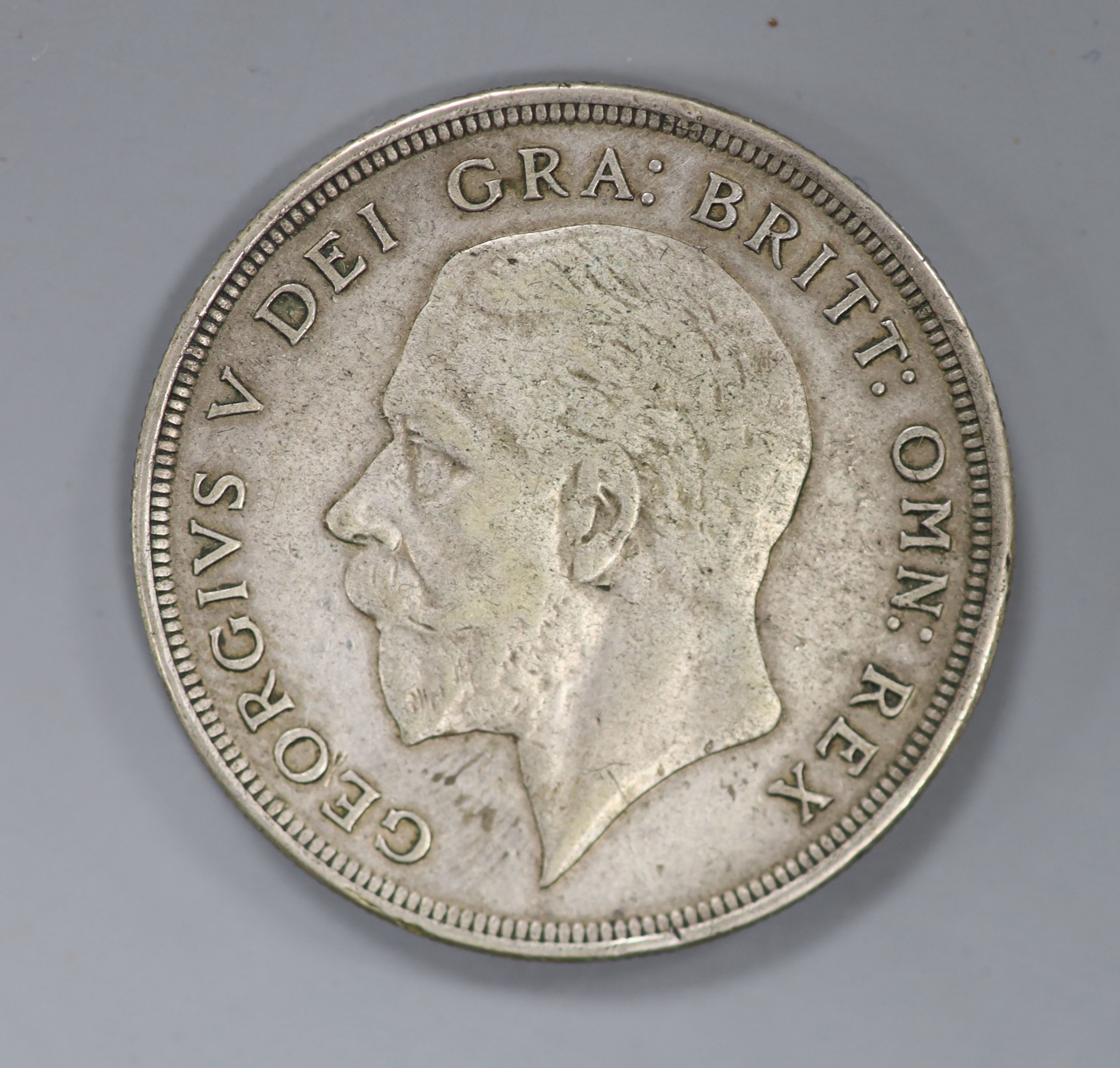 A George V crown, 1928 VF or better